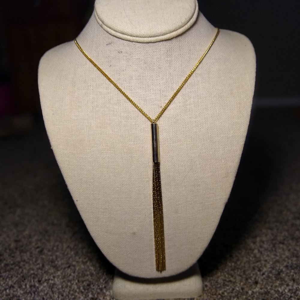 Gold colored dangle necklace